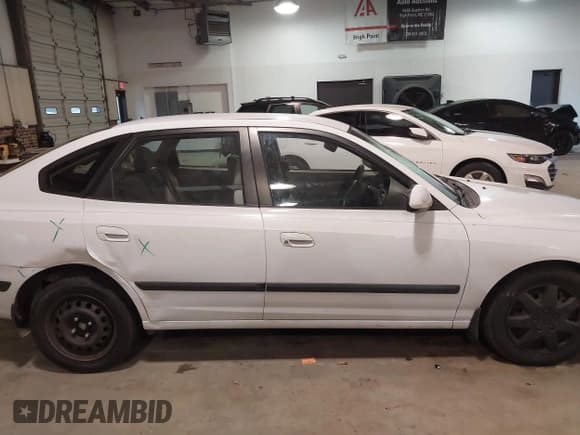 ✅ 2005 Hyundai Elantra GLS • VIN: KMHDN56D65U171907 • Лот: 41051694. Опубликован ранее на IAAI с пробегом 103 899 миль. Бесплатный доступ к архиву аукционных продаж из США и подробный отчёт об истории автомобиля на DreamBid. Изображение 13.