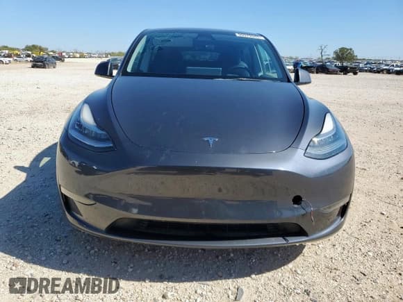 ✅ 2023 Tesla Model Y Long Range • VIN: 7SAYGDEE3PA057847 • Лот: 90979345. Опубликован ранее на Copart с пробегом 51 020 миль. Бесплатный доступ к архиву аукционных продаж из США и подробный отчёт об истории автомобиля на DreamBid. Изображение 5.