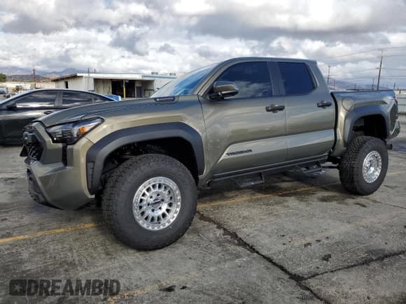 ✅ 2024 Toyota Tacoma TRD Off Road Hybrid • VIN: 3TYLC5LN9RT015510 • Lot: 82502775. Listed on Copart with 8,386 mi. Free auction sales archive from the USA and detailed vehicle history report at DreamBid. Image 1.