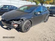 ✅ 2016 Tesla Model X P90D • VIN: 5YJXCBE41GF021934 • Lot: 43461794. Listed on IAAI with 159,494 mi. Free auction sales archive from the USA and detailed vehicle history report at DreamBid. Image 2.