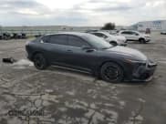 ✅ 2025 Kia K4 GT-Line Turbo • VIN: 3KPFW4DC8SE101320 • Lot: 71191955. Listed on Copart with 9,399 mi. Free auction sales archive from the USA and detailed vehicle history report at DreamBid. Image 4.