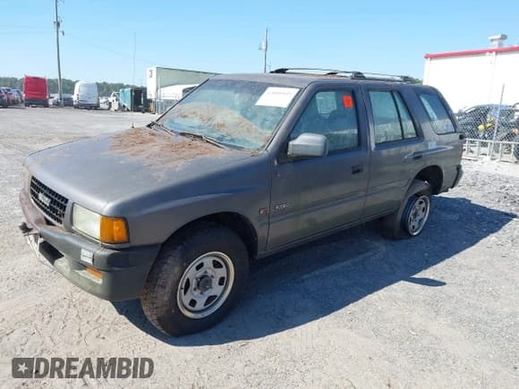 ✅ 1996 Isuzu Rodeo • VIN: 4S2CK58V5T4310439 • Лот: 43089493. Опубликован ранее на IAAI с пробегом 126 998 миль. Бесплатный доступ к архиву аукционных продаж из США и подробный отчёт об истории автомобиля на DreamBid. Изображение 2.