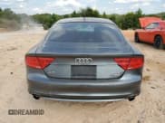 ✅ 2013 Audi A7 • VIN: WAU3GBFC2DN052709 • Лот: 71460345. Опубликован ранее на Copart с пробегом 148 628 миль. Бесплатный доступ к архиву аукционных продаж из США и подробный отчёт об истории автомобиля на DreamBid. Изображение 6.