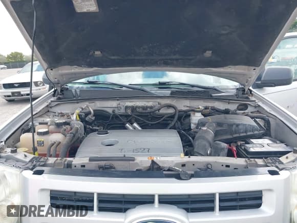 ✅ 2011 Ford Escape Hybrid • VIN: 1FMCU4K3XBKC60103 • Lot: 42048614. Wystawiony na IAAI z przebiegiem 125 354 mil. Bezpłatny archiwum sprzedaży aukcyjnych z USA i szczegółowy raport historii pojazdu na DreamBid. Zdjęcie 10.