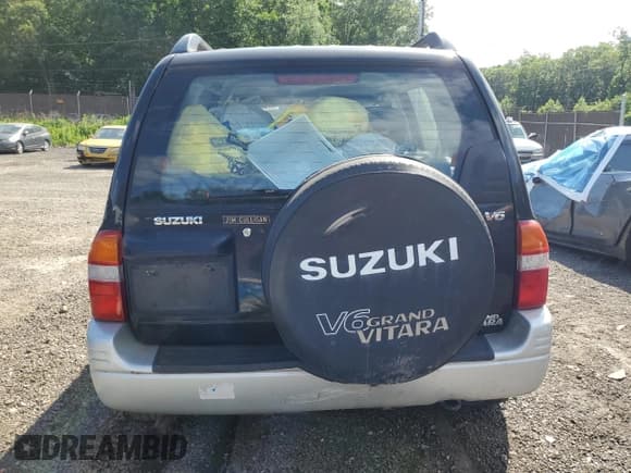 ✅ 1999 Suzuki Grand Vitara JLX • VIN: JS3TD62VXX4100236 • Лот: 57228075. Опубликован ранее на Copart с пробегом Не указан. Бесплатный доступ к архиву аукционных продаж из США и подробный отчёт об истории автомобиля на DreamBid. Изображение 6.