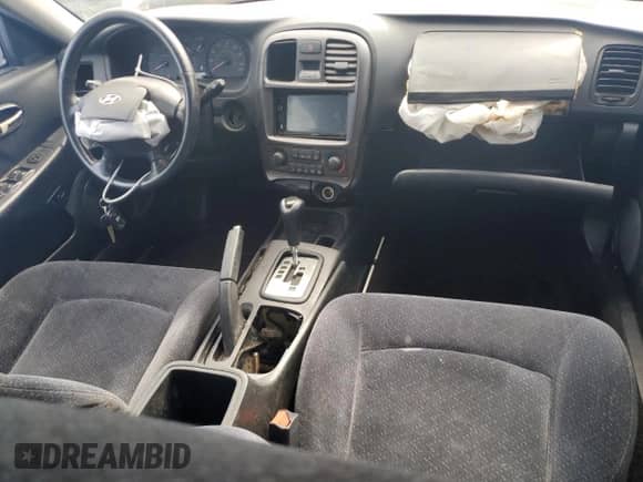 2002 Hyundai Sonata GL с VIN KMHWF25H12A643629, выставлен на аукционе Copart как лот 63307285 с пробегом 158 210 миль миль и Списание • Salvage title. История ставок и продаж доступна на DreamBid. Изображение 8.