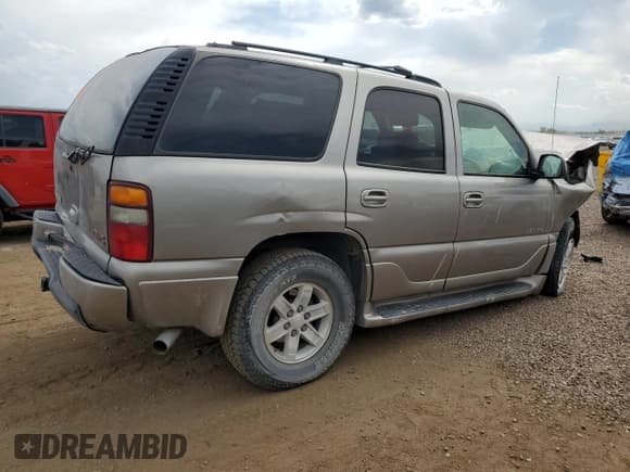 ✅ 2002 GMC Yukon Denali • VIN: 1GKEK63U22J215821 • Lot: 64679475. Listed on Copart with 259,186 mi. Free auction sales archive from the USA and detailed vehicle history report at DreamBid. Image 3.