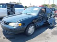 ✅ 1999 Toyota Corolla VE • VIN: 1NXBR12E4XZ251809 • Lot: 42910359. Listed on IAAI with 150,200 mi. Free auction sales archive from the USA and detailed vehicle history report at DreamBid. Image 2.