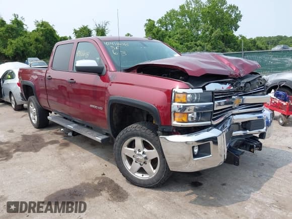 ✅ 2015 Chevrolet Silverado 2500HD LT • VIN: 1GC1KVE83FF102831 • Lot: 42411608. Listed on IAAI with 140,538 mi. Free auction sales archive from the USA and detailed vehicle history report at DreamBid. Image 1.