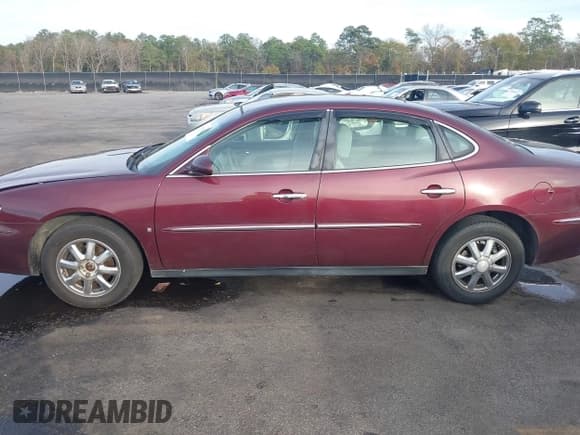 ✅ 2007 Buick LaCrosse CX • VIN: 2G4WC582671135241 • Lot: 43763610. Wystawiony na IAAI z przebiegiem 192 384 mil. Bezpłatny archiwum sprzedaży aukcyjnych z USA i szczegółowy raport historii pojazdu na DreamBid. Zdjęcie 14.