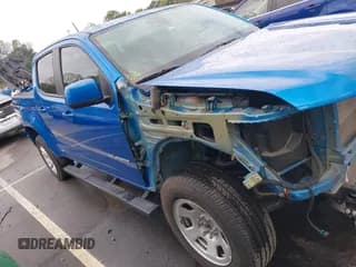 ✅ 2021 Chevrolet Colorado 4WD LT • VIN: 1GCGTCEN2M1198141 • Лот: 43291686. Опубликован ранее на IAAI с пробегом 51 602 миль. Бесплатный доступ к архиву аукционных продаж из США и подробный отчёт об истории автомобиля на DreamBid. Изображение 1.