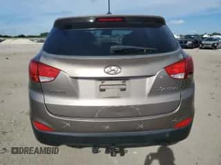 2013 Hyundai Tucson GL z VIN KM8JT3AB5DU654984, wystawiony jako Copart lot #72258644 z przebiegiem 123 394 mil mil oraz Szkoda całkowita • Salvage title. Historia ofert i sprzedaży dostępna na DreamBid. Obrazek 6.