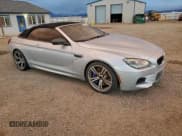 ✅ 2014 BMW M6 • VIN: WBSLZ9C50EDZ78344 • Lot: 94000445. Listed on Copart with 59,558 mi. Free auction sales archive from the USA and detailed vehicle history report at DreamBid. Image 4.