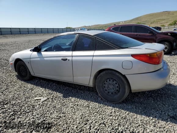 ✅ 2001 Saturn SC • VIN: 1G8ZP12891Z219977 • Лот: 60248255. Опубликован ранее на Copart с пробегом 230 514 миль. Бесплатный доступ к архиву аукционных продаж из США и подробный отчёт об истории автомобиля на DreamBid. Изображение 2.