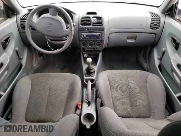 2004 Hyundai Accent с VIN KMHCF35C64U311491, выставлен на аукционе Copart как лот 42911004 с пробегом 178 487 миль миль и Списание • Salvage title. История ставок и продаж доступна на DreamBid. Изображение 8.