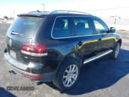 ✅ 2008 Volkswagen Touareg V6 • VIN: WVGBE77L78D078715 • Lot: 43550387. Listed on IAAI with 99,235 mi. Free auction sales archive from the USA and detailed vehicle history report at DreamBid. Image 4.