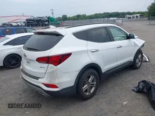 ✅ 2018 Hyundai Santa Fe 2.4L • VIN: 5XYZU3LB4JG566054 • Лот: 42918543. Опубликован ранее на IAAI с пробегом 95 595 миль. Бесплатный доступ к архиву аукционных продаж из США и подробный отчёт об истории автомобиля на DreamBid. Изображение 4.