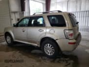 ✅ 2011 Mercury Mariner Premier • VIN: 4M2CN9HG9BKJ06775 • Lot: 59256315. Listed on Copart with 186,694 mi. Free auction sales archive from the USA and detailed vehicle history report at DreamBid. Image 2.