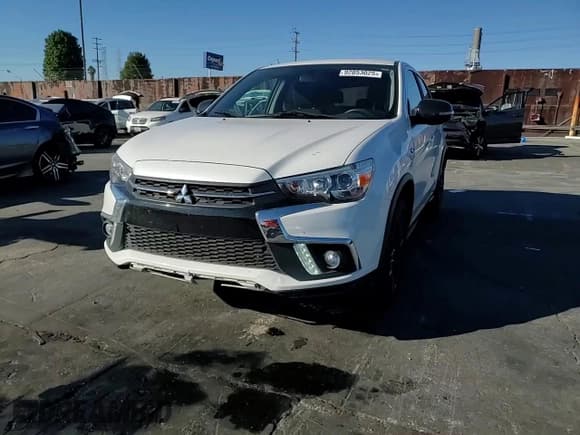 ✅ 2018 Mitsubishi Outlander ES • VIN: JA4AP3AU5JZ024238 • Lot: 92053025. Listed on Copart with 96,194 mi. Free auction sales archive from the USA and detailed vehicle history report at DreamBid. Image 14.