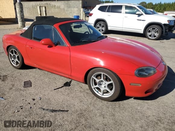 ✅ 2004 Mazda MX-5 Miata LS • VIN: JM1NB353740400440 • Lot: 90716375. Listed on Copart with 181,453 mi. Free auction sales archive from the USA and detailed vehicle history report at DreamBid. Image 4.