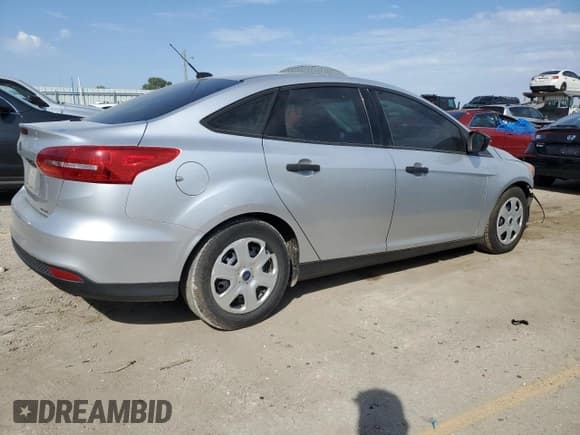 ✅ 2015 Ford Focus S • VIN: 1FADP3E27FL275015 • Lot: 84890745. Listed on Copart with 129,700 mi. Free auction sales archive from the USA and detailed vehicle history report at DreamBid. Image 3.