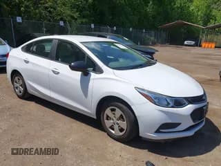✅ 2018 Chevrolet Cruze LS • VIN: 1G1BB5SM6J7117261 • Lot: 42157339. Listed on IAAI with 146,013 mi. Free auction sales archive from the USA and detailed vehicle history report at DreamBid. Image 1.