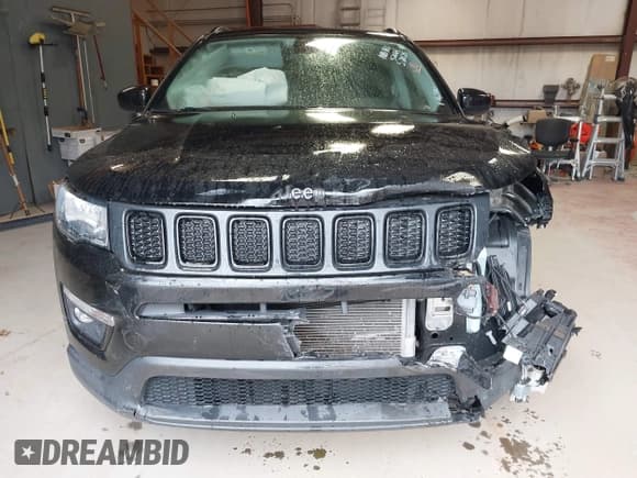 ✅ 2021 Jeep Compass Latitude • VIN: 3C4NJDBB9MT552064 • Lot: 42345320. Listed on IAAI with 57,080 mi. Free auction sales archive from the USA and detailed vehicle history report at DreamBid. Image 12.