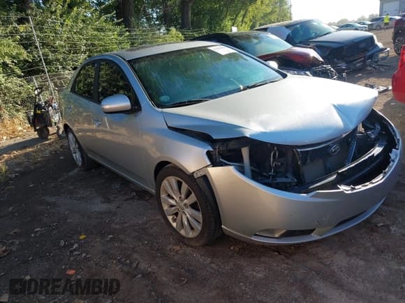 ✅ 2010 Kia Forte SX • VIN: KNAFW4A32A5140741 • Лот: 43068808. Опубликован ранее на IAAI с пробегом 97 028 миль. Бесплатный доступ к архиву аукционных продаж из США и подробный отчёт об истории автомобиля на DreamBid. Изображение 1.