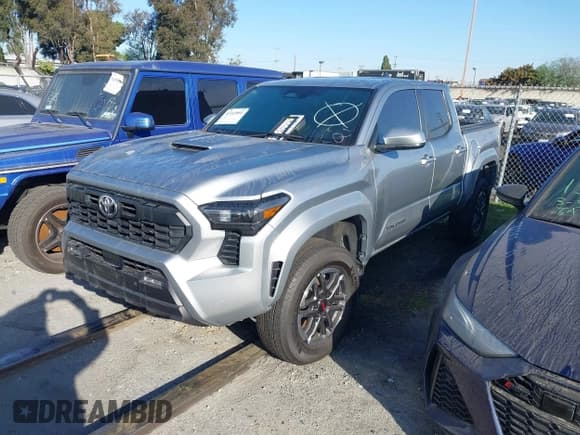 ✅ 2024 Toyota Tacoma SR5 • VIN: 3TMLB5JN4RM021667 • Лот: 41343801. Опубликован ранее на IAAI с пробегом 5 037 миль. Бесплатный доступ к архиву аукционных продаж из США и подробный отчёт об истории автомобиля на DreamBid. Изображение 2.