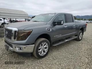 ✅ 2016 Nissan Titan SV • VIN: 1N6AA1F2XGN509474 • Lot: 71860645. Listed on Copart with 73,288 mi. Free auction sales archive from the USA and detailed vehicle history report at DreamBid. Image 1.