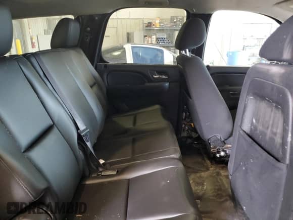 2013 Chevrolet Tahoe Commercial с VIN 1GNLC2E06DR339959, выставлен на аукционе Copart как лот 80303465 с пробегом 124 716 миль миль и Списание • Salvage title. История ставок и продаж доступна на DreamBid. Изображение 11.