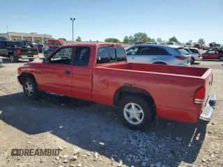 1999 Dodge Dakota SLT z VIN 1B7GL22X1XS249532, wystawiony jako Copart lot #56391484 z przebiegiem 154 117 mil mil oraz Szkoda całkowita • Salvage title. Historia ofert i sprzedaży dostępna na DreamBid. Obrazek 2.