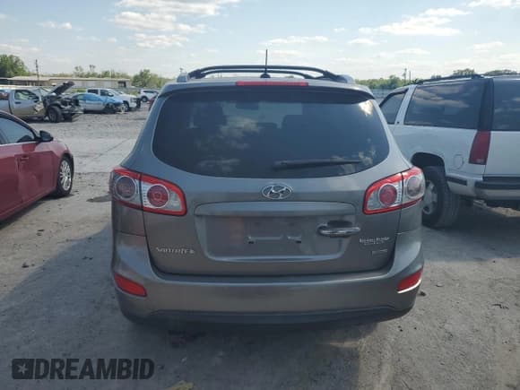 ✅ 2012 Hyundai Santa Fe Limited • VIN: 5XYZK3AB0CG095385 • Lot: 52490164. Listed on Copart with Not provided. Free auction sales archive from the USA and detailed vehicle history report at DreamBid. Image 6.