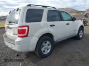 ✅ 2009 Ford Escape Hybrid • VIN: 1FMCU59399KB39651 • Lot: 43716212. Wystawiony na IAAI z przebiegiem 113 770 mil. Bezpłatny archiwum sprzedaży aukcyjnych z USA i szczegółowy raport historii pojazdu na DreamBid. Zdjęcie 4.