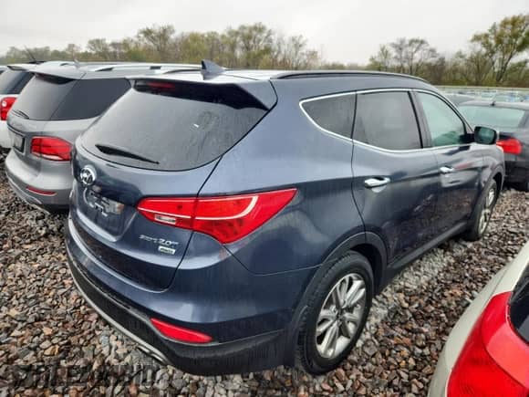 ✅ 2015 Hyundai Santa Fe • VIN: 5XYZUDLA7FG285886 • Лот: 90075335. Опубликован ранее на Copart с пробегом 211 802 миль. Бесплатный доступ к архиву аукционных продаж из США и подробный отчёт об истории автомобиля на DreamBid. Изображение 3.