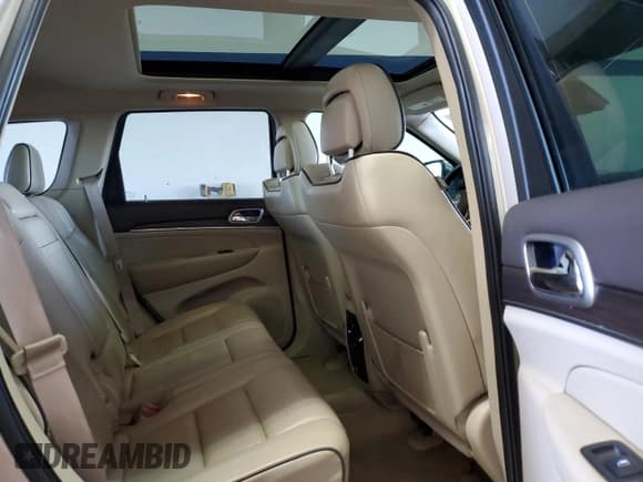 ✅ 2015 Jeep Grand Cherokee Overland • VIN: 1C4RJFCG7FC673181 • Lot: 46527875. Listed on Copart with 124,503 mi. Free auction sales archive from the USA and detailed vehicle history report at DreamBid. Image 12.