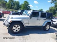 ✅ 2008 Jeep Wrangler Unlimited Sahara • VIN: 1J8GA591X8L628123 • Lot: 43102623. Listed on IAAI with 231,500 mi. Free auction sales archive from the USA and detailed vehicle history report at DreamBid. Image 14.