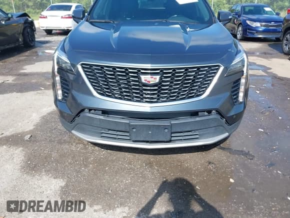 ✅ 2021 Cadillac XT4 FWD Premium Luxury • VIN: 1GYFZCR42MF007617 • Лот: 42437974. Опубликован ранее на IAAI с пробегом 126 071 миль. Бесплатный доступ к архиву аукционных продаж из США и подробный отчёт об истории автомобиля на DreamBid. Изображение 6.
