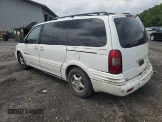 ✅ 1999 Pontiac Montana • VIN: 1GMDX03E3XD195661 • Lot: 62892514. Wystawiony na Copart z przebiegiem 225 516 mil. Bezpłatny archiwum sprzedaży aukcyjnych z USA i szczegółowy raport historii pojazdu na DreamBid. Zdjęcie 2.