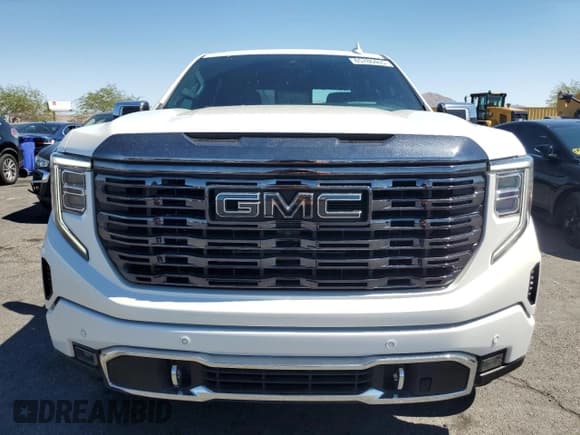✅ 2022 GMC Sierra 1500 Denali Ultimate • VIN: 1GTUUHET9NZ621327 • Lot: 65786465. Wystawiony na Copart z przebiegiem 25 059 mil. Bezpłatny archiwum sprzedaży aukcyjnych z USA i szczegółowy raport historii pojazdu na DreamBid. Zdjęcie 5.