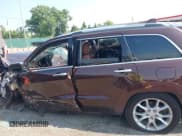 ✅ 2015 Jeep Grand Cherokee Summit • VIN: 1C4RJFJG5FC173636 • Lot: 42852043. Listed on IAAI with Not provided. Free auction sales archive from the USA and detailed vehicle history report at DreamBid. Image 13.