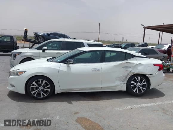 ✅ 2017 Nissan Maxima SL • VIN: 1N4AA6AP5HC407375 • Lot: 42249400. Listed on IAAI with 102,259 mi. Free auction sales archive from the USA and detailed vehicle history report at DreamBid. Image 14.