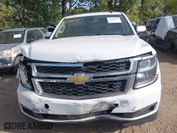 2015 Chevrolet Tahoe LT z VIN 1GNSKBKC3FR279459, wystawiony jako IAAI lot #43349972 z przebiegiem 112 043 mil mil oraz . Historia ofert i sprzedaży dostępna na DreamBid. Obrazek 12.