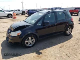 ✅ 2012 Suzuki SX4 Crossover • VIN: JS2YB5A37C6305411 • Лот: 70093714. Опубликован ранее на Copart с пробегом 110 956 миль. Бесплатный доступ к архиву аукционных продаж из США и подробный отчёт об истории автомобиля на DreamBid. Изображение 1.