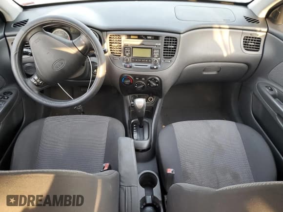 ✅ 2009 Kia Rio LX • VIN: KNADE223396514339 • Lot: 68562514. Listed on Copart with 189,185 mi. Free auction sales archive from the USA and detailed vehicle history report at DreamBid. Image 8.