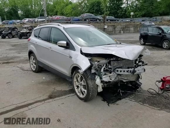 ✅ 2015 Ford Escape Titanium • VIN: 1FMCU9J99FUA02166 • Lot: 58898295. Listed on Copart with 147,344 mi. Free auction sales archive from the USA and detailed vehicle history report at DreamBid. Image 15.