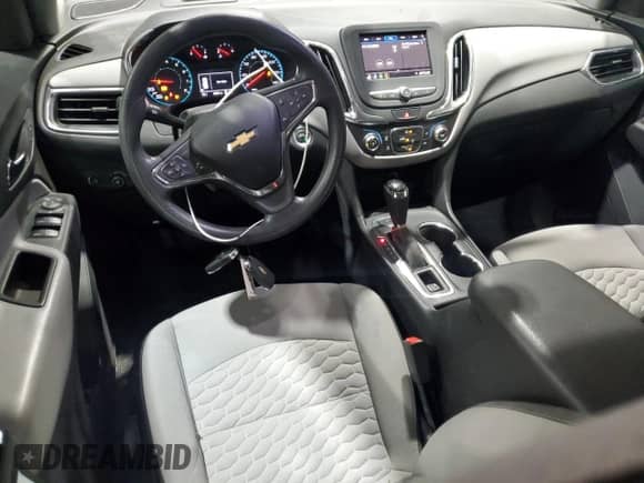 2020 Chevrolet Equinox LS z VIN 3GNAXSEV1LS730827, wystawiony jako Copart lot #89469215 z przebiegiem 129 951 mil mil oraz Czysty tytuł • Clean title. Historia ofert i sprzedaży dostępna na DreamBid. Obrazek 8.