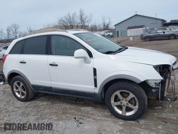 ✅ 2012 Chevrolet Captiva Sport LS • VIN: 3GNAL2EK9CS574019 • Lot: 41977669. Wystawiony na IAAI z przebiegiem 73 769 mil. Bezpłatny archiwum sprzedaży aukcyjnych z USA i szczegółowy raport historii pojazdu na DreamBid. Zdjęcie 14.