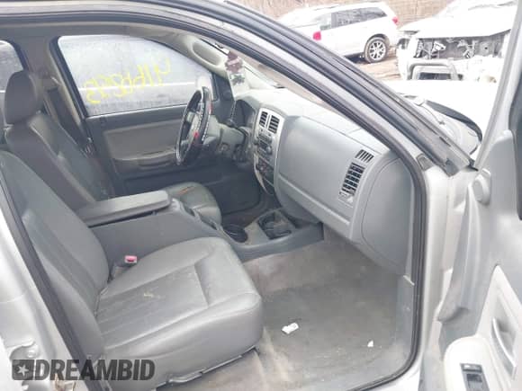 2005 Dodge Dakota Laramie with VIN 1D7HE58N05S244878, listed as a IAAI auction lot 41662513 with 171,323 mi miles and . Bid and sale history available at DreamBid. Image 5.