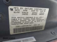 ✅ 1997 Saturn SC • VIN: 1G8ZF1280VZ261592 • Lot: 43468001. Listed on IAAI with 220,986 mi. Free auction sales archive from the USA and detailed vehicle history report at DreamBid. Image 9.